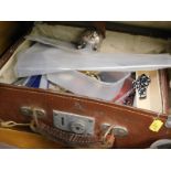 A brown leather travel case, containing a quantity of various items, various costume jewellery, souv