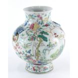 A 19thC Chinese porcelain globular vase, decorated with a selection of flowers and trailing foliage,