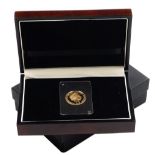 A 2015 Winston Churchill commemorative gold half crown, in fitted box with outer box, lacking certif
