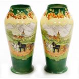 A pair of early 20thC Frank Beardmore pottery vases, Sutherland Art Ware, decorated in The Two Horse