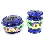 Two Ringtons Mailing ware posy holders, in blue glaze decorated with a band of pansies against a gre