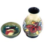 A Moorcroft pottery vase in the Orchid pattern, of baluster form, impressed marks, 12cm high, and a