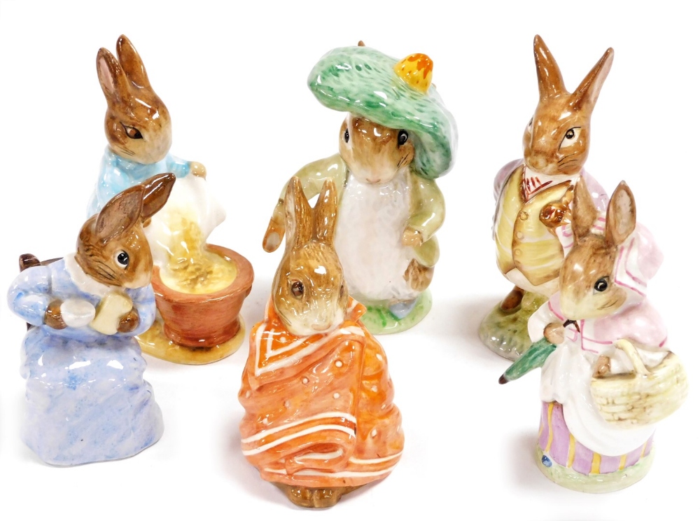 A group of Beswick Beatrix Potter figures, comprising Mrs Rabbit, Cottontail, Poorly Peter Rabbit, B