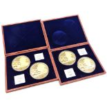 Two boxes containing medallions or large coins, depicting American presidents, each with Swarovski C