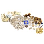 A group of British and foreign coins, bank notes, etc., to include small amount of silver. (a quanti