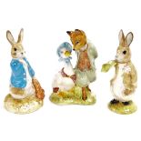 Three Beswick Beatrix Potter pottery figures, comprising Jemina Puddleduck and The Foxy Whiskered Ge