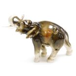 A Royal Dux porcelain figure of an elephant, printed marks, 20cm high.