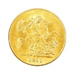 A George V gold five pound coin, dated 1911, 40.3g.