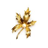 A 9ct gold leaf brooch, the five point leaf with central cultured pearl, on a single pin back, 5cm w