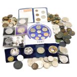 A group of coins, to include cartwheel penny, George III 1823 token, commemorative crowns, 18th and