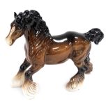 A Beswick pottery figure of a cantering shire horse, printed marks, 21cm high.