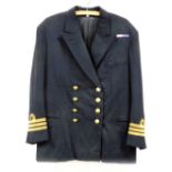 A Royal Navy Commander's black wool naval jacket, the front with six gold coloured buttons, with gol
