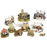 A group of Lilliput Lane cottages, to include The Three Kings, Lead Knightly Light, Christmas Lights