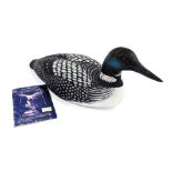 A Ma Hai Feng carved wooden figure of a Loon bird, with painted detailing, with booklet about the ar