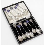 Various silver teaspoons, comprising four George V silver teaspoons, with Balmoral crest decorated h
