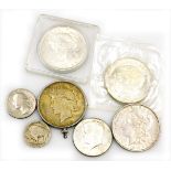 A USA 1922 silver dollar, mounted (AF), another silver 1922 dollar, an 1883 one dollar, a Mexican 19