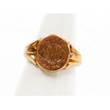 A 9ct rose gold signet ring, with circular ring head on three splayed shoulders, bearing the initial