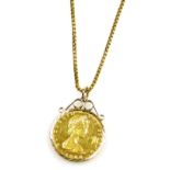 An Elizabeth II Isle of Man gold one pound coin 1980, in a 9ct gold pendant mount, together with a p