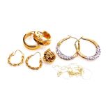 Three pairs of 9ct gold hoop earrings, together with a single knot earring and a neck chain, 9.0g.