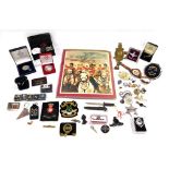 Militaria. Badges, commemorative coins, car badges, etc. (a quantity)