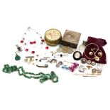 A group of costume jewellery and effects, comprising jadeite necklace, stone set bar brooches, clip