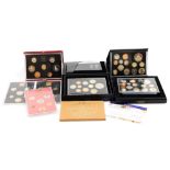 A 2012 United Kingdom proof coin set, 2010 British proof coin collection set, and other annual coin