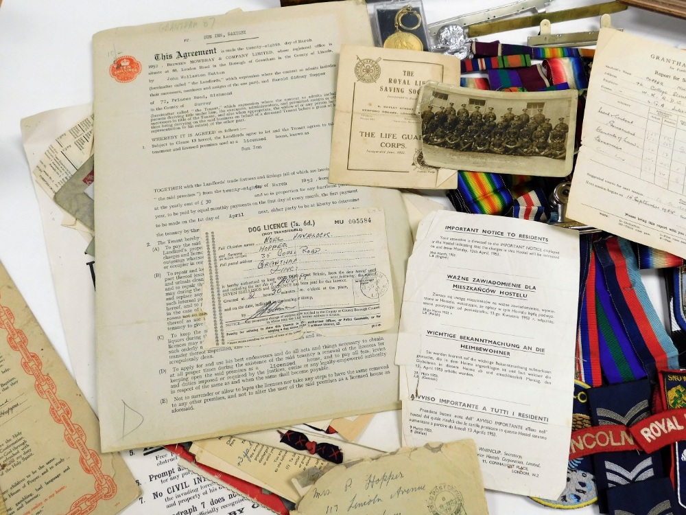 Militaria and sundry ephemera, relating to the Hopper family of Lincolnshire, including cap badges, - Image 2 of 9