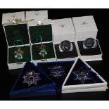 A group of Swarovski Crystal, comprising two angel Christmas tree decorations, boxed, Christmas orna