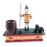 A reproduction Trick Dog cast iron money box, 19cm high.