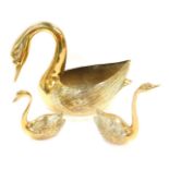Three brass swan ornaments, comprising a large swan planter, with arch to neck, 25cm high, and two