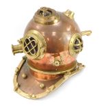 A Siebe Gorman reproduction copper and brass diver's helmet, 42cm high.