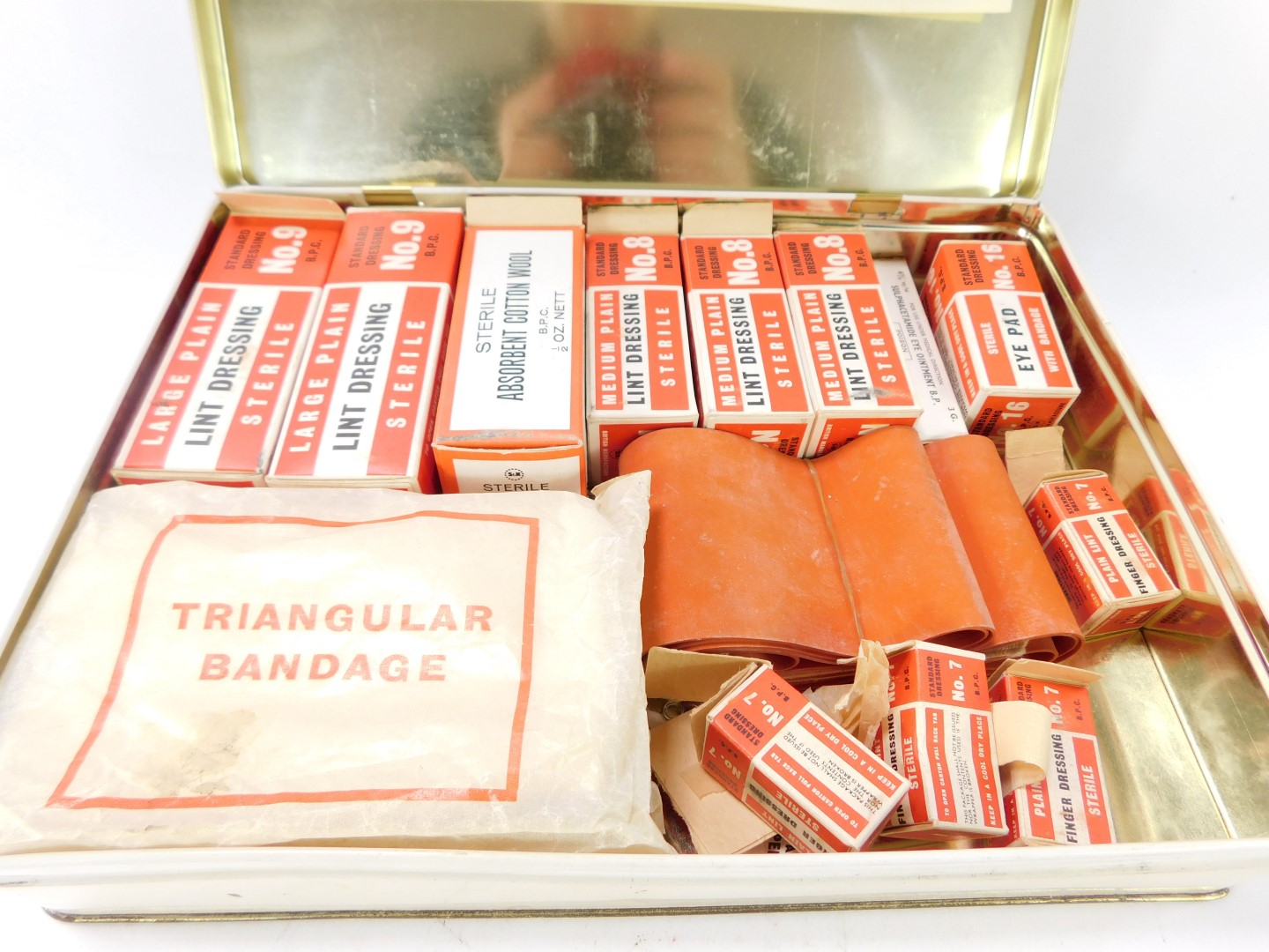 A 1960's/1970's first aid kit, with white enamel tin and contents, to include triangular bandage, - Image 3 of 3