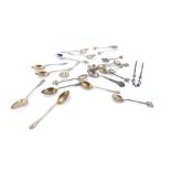 A group of silver and silver plated spoons, comprising a set of nine Continental and gilt spoons,