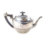 A Victorian semi fluted silver teapot, engraved 'B.H Danger 1st', Joseph Rodgers & Sons, Sheffield