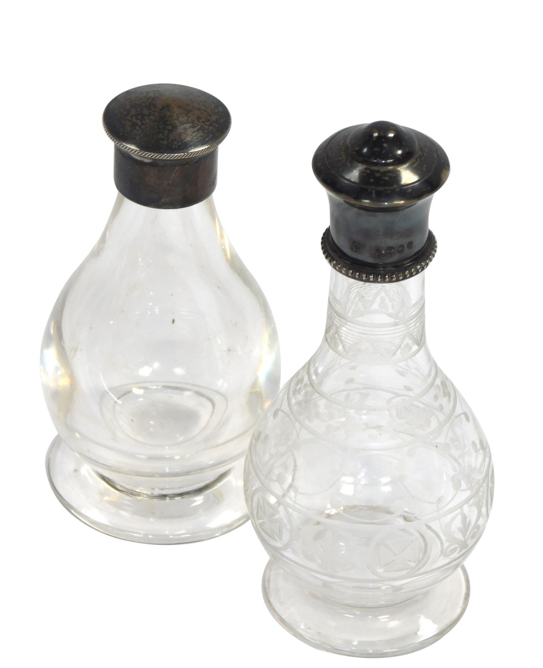A Victorian glass communion bottle, of baluster form, with engraved decoration, silver mount and