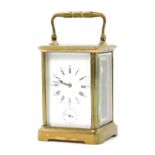 A Hards 19thC brass carriage clock, the white enamel dial bearing Roman numerals, subsidiary alarm