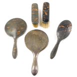 A George V silver and tortoiseshell four piece dressing set, monogrammed AP, comprising hand