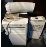 An Air Conditioning Centre air unit, dehumidifier, water heater for boiler, and various piping. (a