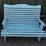 A painted wooden garden bench.