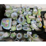 Various moss ware ornaments, each in the garden pattern with applied moss and flower detailing, to