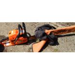 A Kiam petrol chain saw, with carry case, Sherwood KM58-20 model.