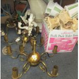 Various wall light fittings, comprising two brass chandeliers, two painted wooden wall lights,