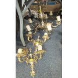 A gilt six branch candelabrum and two matching wall lights. (3)