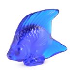 A 20thC Lalique blue glass figure of a fish, signed, 6cm high.