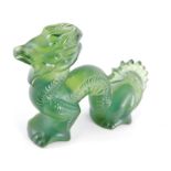 A 20thC Lalique green glass figure of a dragon, signed, 9cm wide.