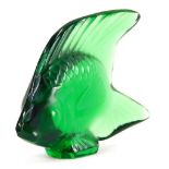 A 20thC Lalique green glass figure of a fish, signed, 6cm high.