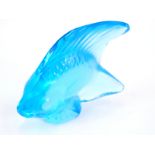 A 20thC Lalique blue glass figure of a fish, signed, 6cm high.