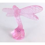 A 20thC Lalique pink glass dragonfly, marked beneath, 9cm high.