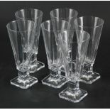 A set of six Baccarat style ale glasses, each with shaped square feet, unmarked, 16cm high. (6)