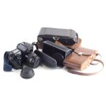 Various camera equipment, Sony lens, Canon EOS 1000F Camera, 9cm high, Ensign Camera Kodak etc, (qua